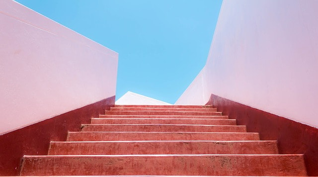 red stairs symbolizing how expanding to walmart marketplace for amazon sellers can help conversion rates